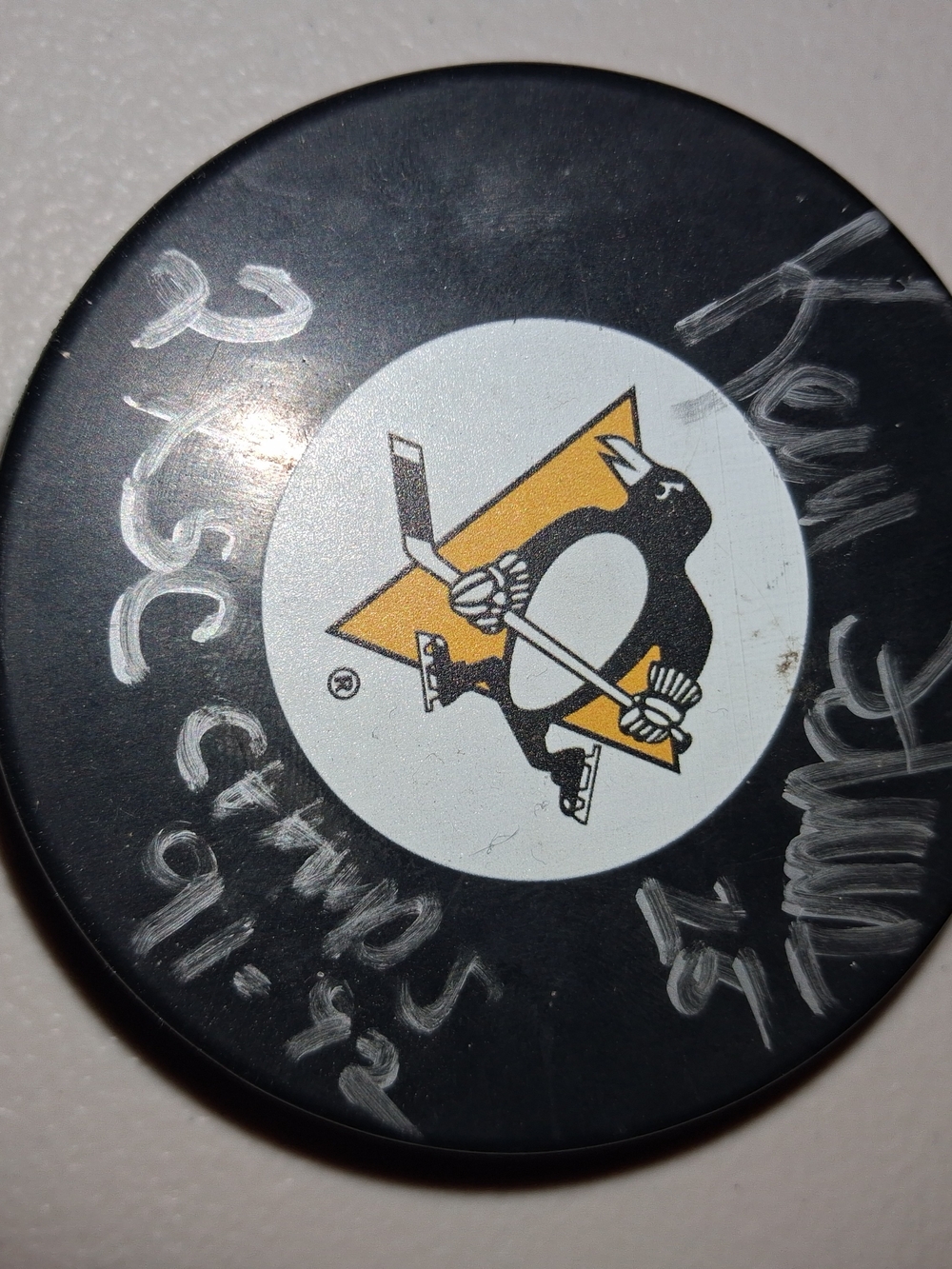 NHL Black Hockey Puck with Silver Official Seal